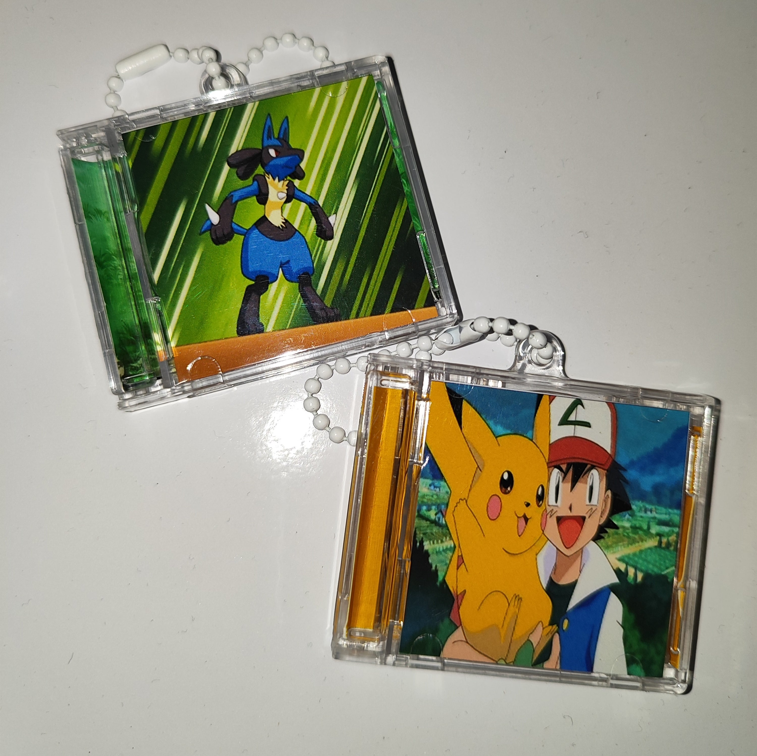 SET OF 2 - POKEMON TAPPABLE KEYCHAINS (EASY ACCESS TO COLLECTR APP FOR POKEMON PRICES)